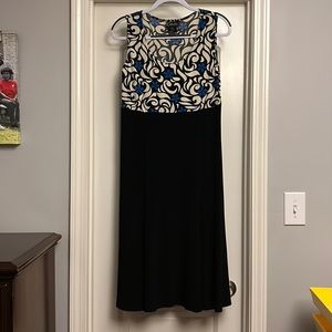 Cute black with blue and tan colors dress mid length size 12